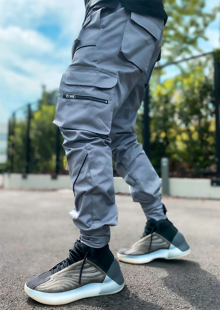 Pantaloni cargo da jogging da palestra con strisce riflettenti alla moda da uomo, vestibilità attillata, con fascia alla caviglia | W302